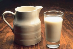 Photo of a pitcher and a glass of milk