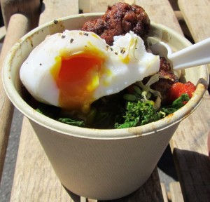 Poached duck egg on lamb bowl