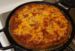 Pepperoni pizza on cast iron pan