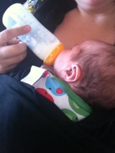 Baby fed with bottle