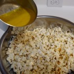 Buttering the popcorn